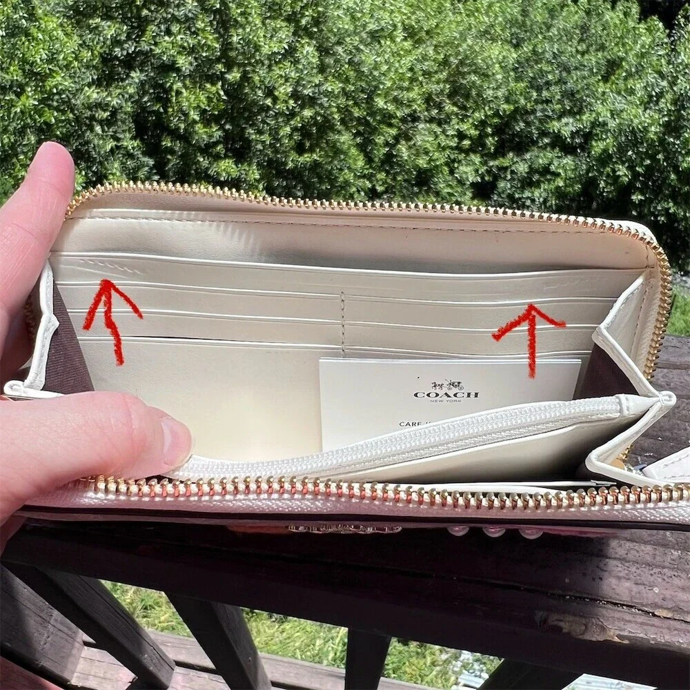 Coach accordion zip